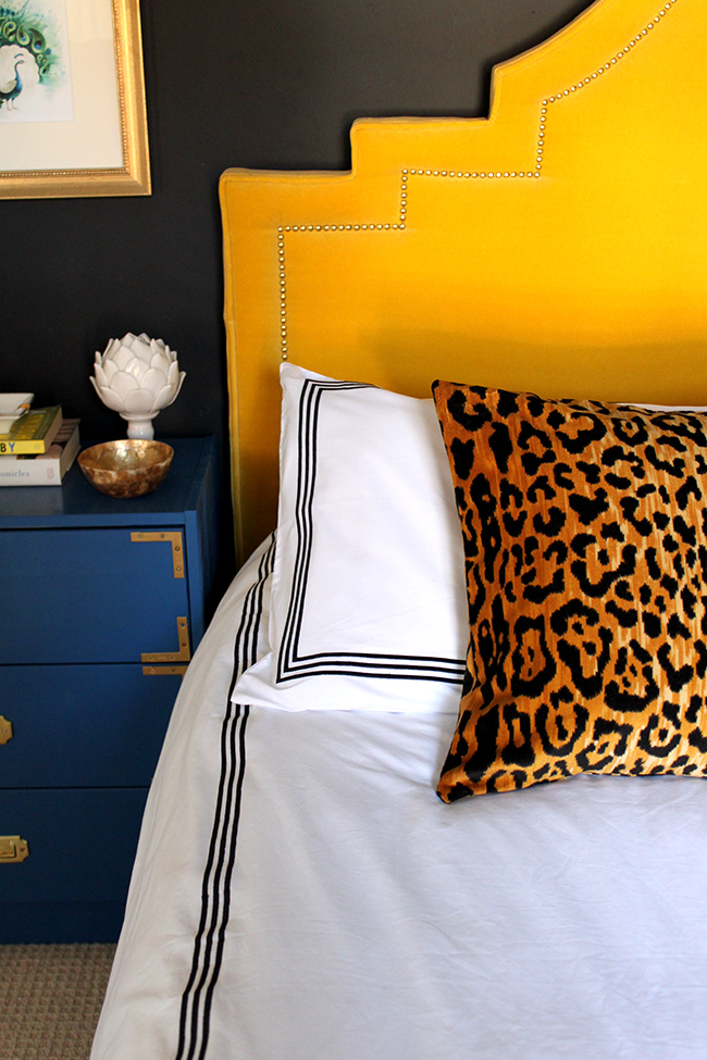 black bedroom yellow headboard