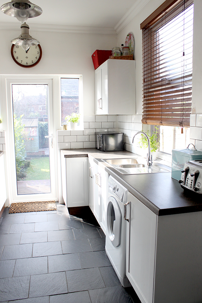 white kitchen with wood accents