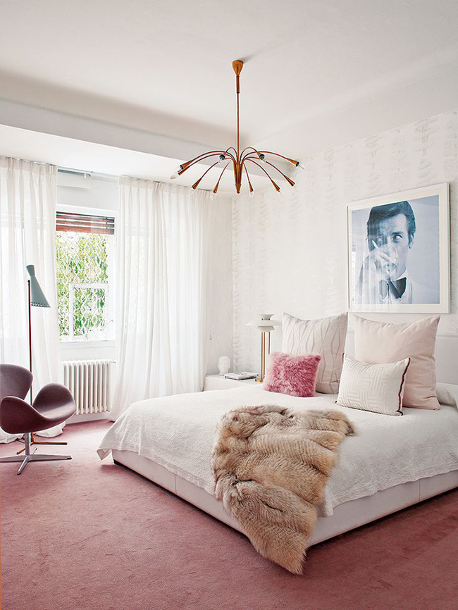 blush pink bedroom with poster