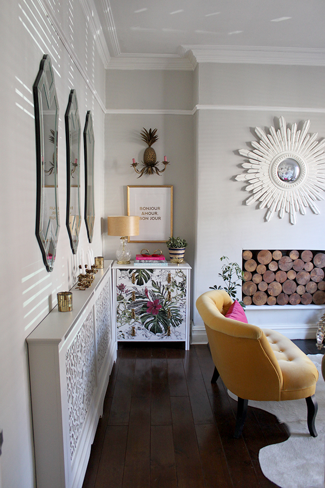 My DIY wallpapered chest of drawers in situe within my living room.