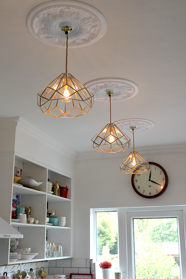 DIY Brass and Glass Kitchen Pendants - Swoon Worthy