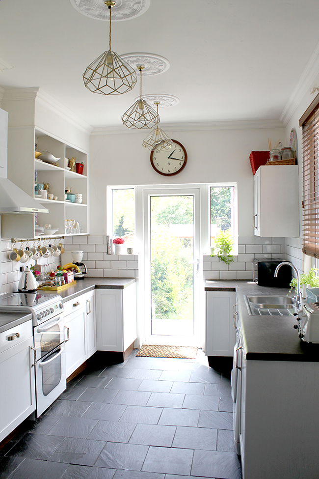 DIY Brass and Glass Kitchen Pendants - Swoon Worthy