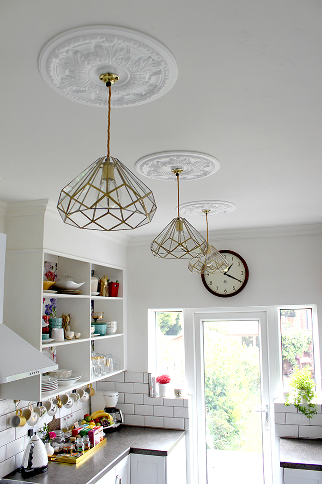 DIY Brass and Glass Kitchen Pendants - Swoon Worthy