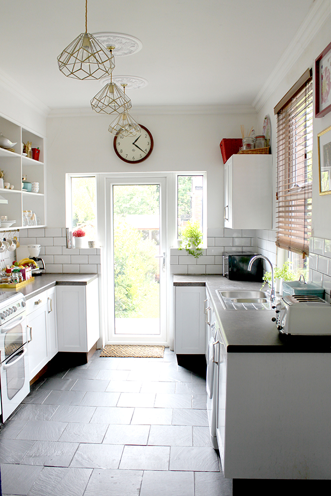 DIY Brass and Glass Kitchen Pendants - Swoon Worthy