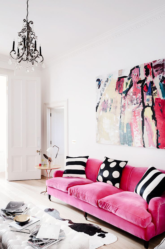 pink sofa and artwork