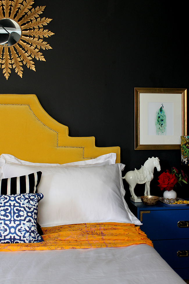 Swoon Worthy - black bedroom with yellow velvet headboard