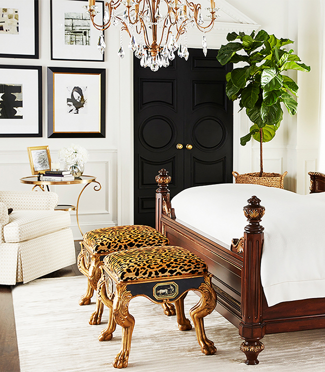 leopard print stools at foot of bed