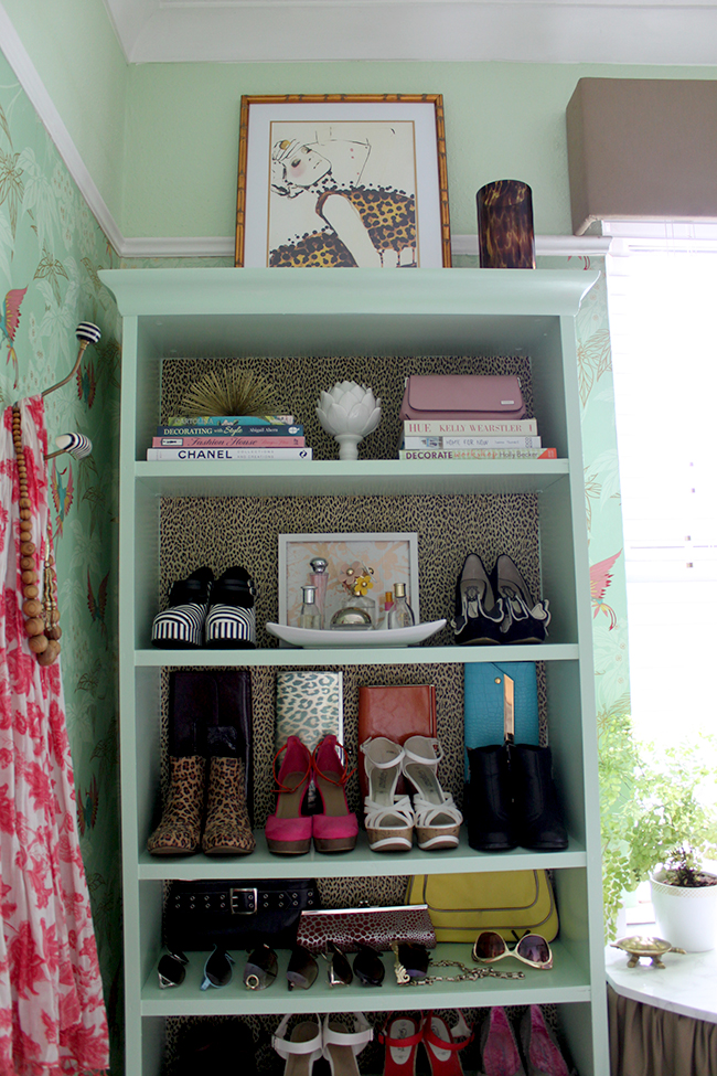 Billy bookcase hack with leopard print wallpaper backs