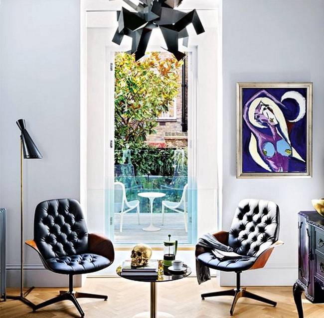 eclectic sitting room in black and lilac