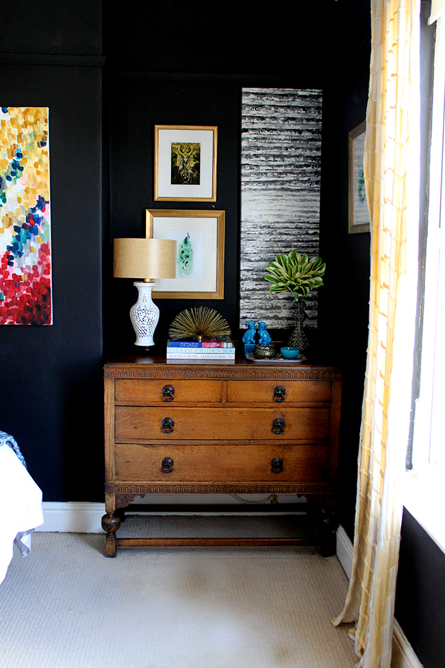 Swoon Worthy bedroom - vintage dresser with black walls and bright accents - www.swoonworthy.org