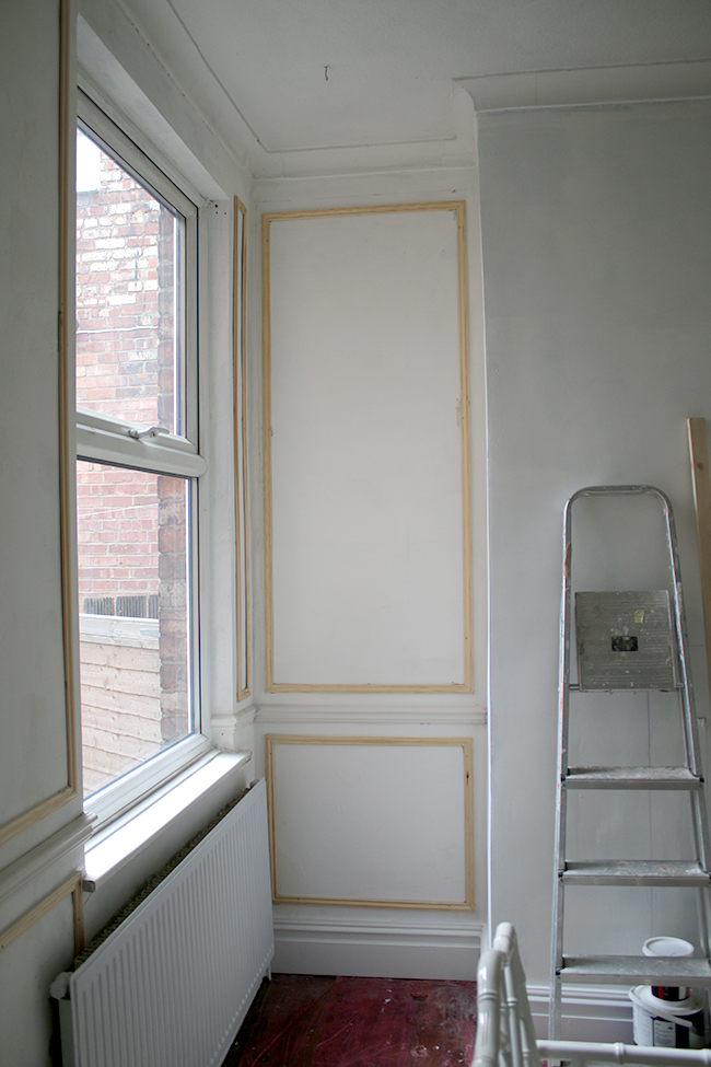 Installing moulding - see more at www.swoonworthy.org