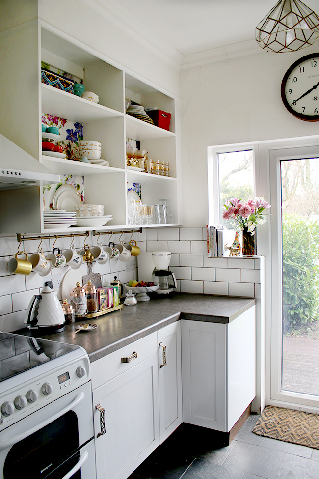 Ruffoni glass jars within my white kitchen with gold accents.