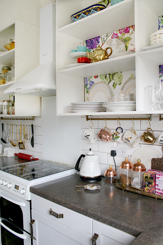 white kitchen with subway tile and colourful accents - see more at www.swoonworthy.org