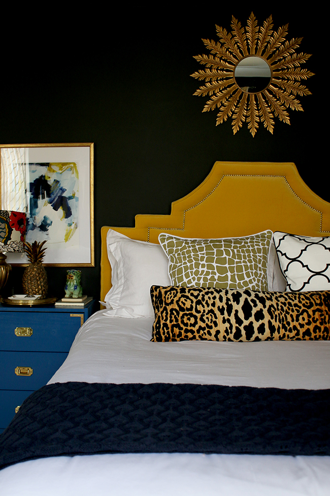 DIY Bolster Cushion Insert tutorial - black bedroom with yellow headboard and leopard print bolster cushion - see more on www.swoonworthy.org