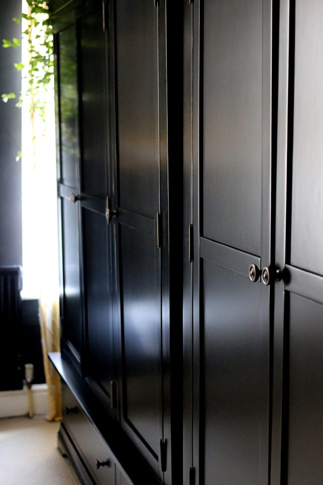 black freestanding wardrobe from Very in black bedroom - see more at www.swoonworthy.org