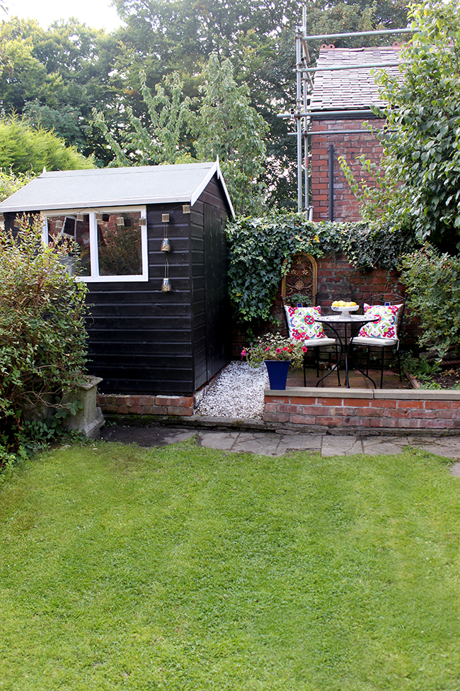 End of garden patio and shed