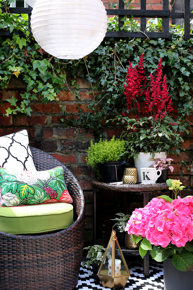 Patio with brick wall with solar chinese lanterns