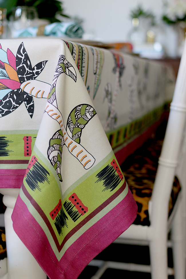 Colourful table setting with plants and animal prints