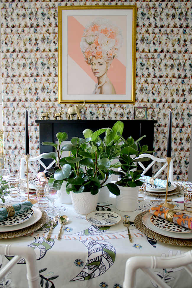 Colourful table setting with plants and animal prints