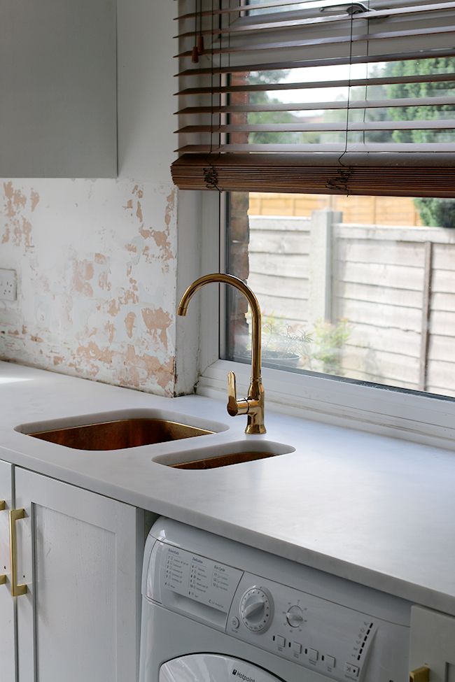 minerva carrara acrylic worktop join around windowsill