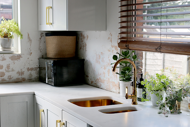 Take a look at my updated kitchen interior including gold kitchen taps and marble worktop