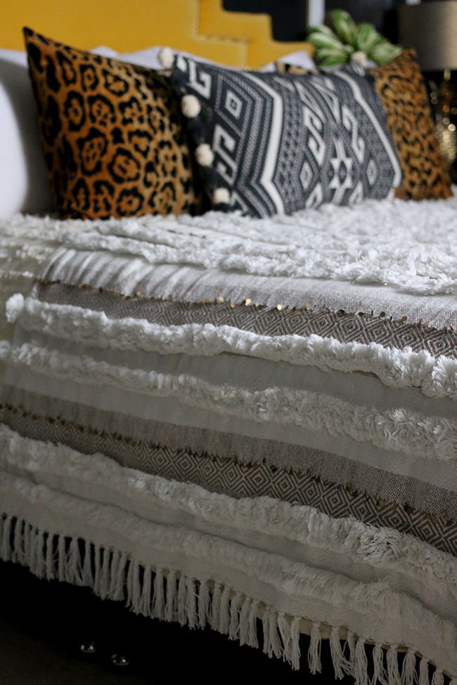 moroccan style wedding blanket with leopard print cushions