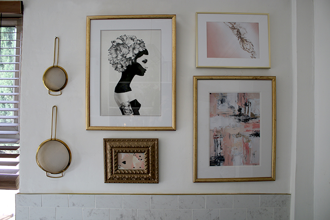 Our kitchen gallery wall with Desenio prints in pink black and white and gold