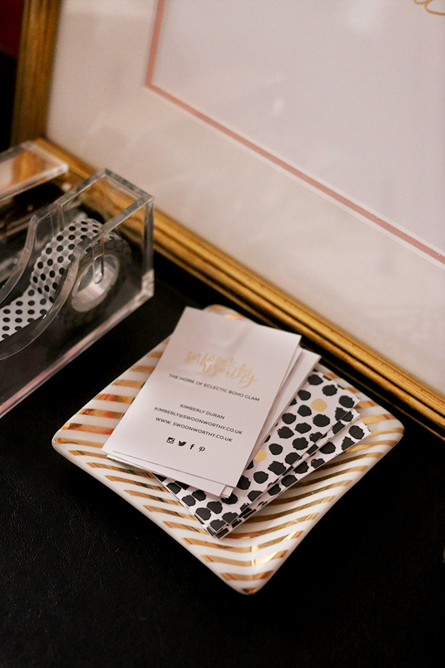 Swoon Worthy business card design on desk gold black polkadots design