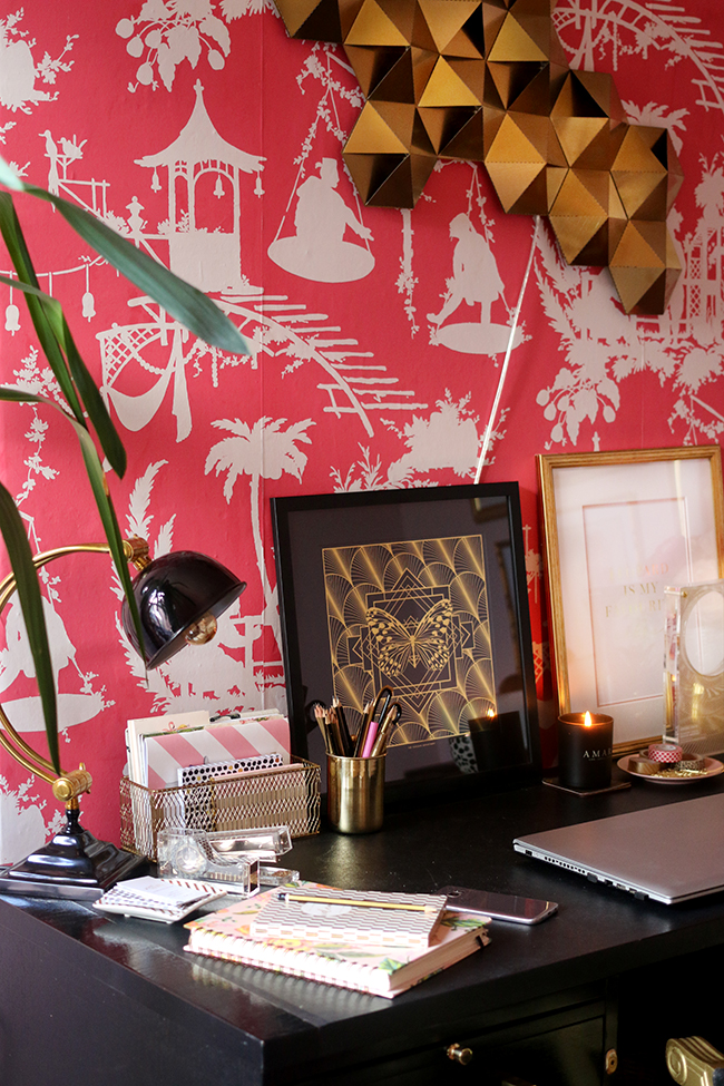 Eclectic boho glam office with blush pink walls and black and gold accents