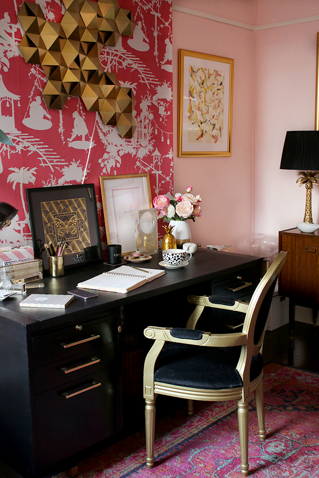 Eclectic boho glam office with blush pink walls and black and gold accents