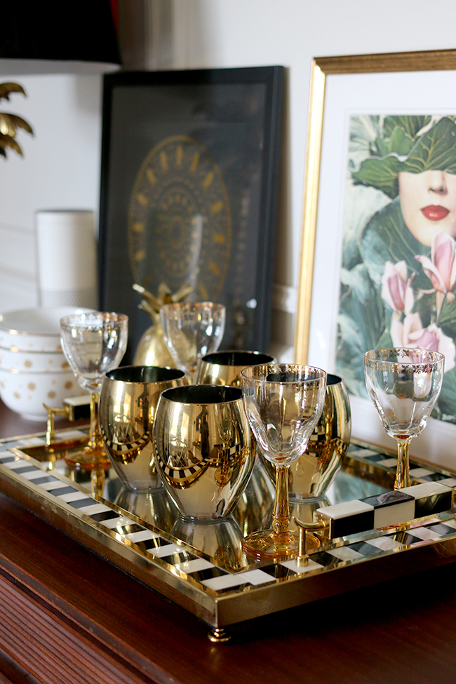 gold and black tray detail with gold glasses