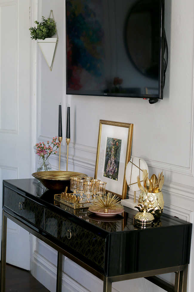 black sideboard with television 