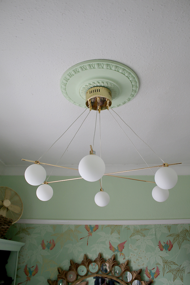 brass and glass globe light fitting from Next