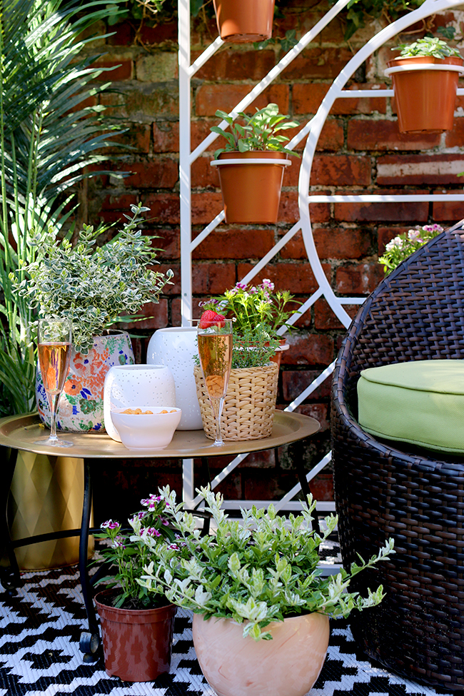 Boho garden pergola in green and pink with gold accents