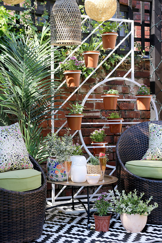 small garden design in Edwardian semi with two separate seating areas including a pergola