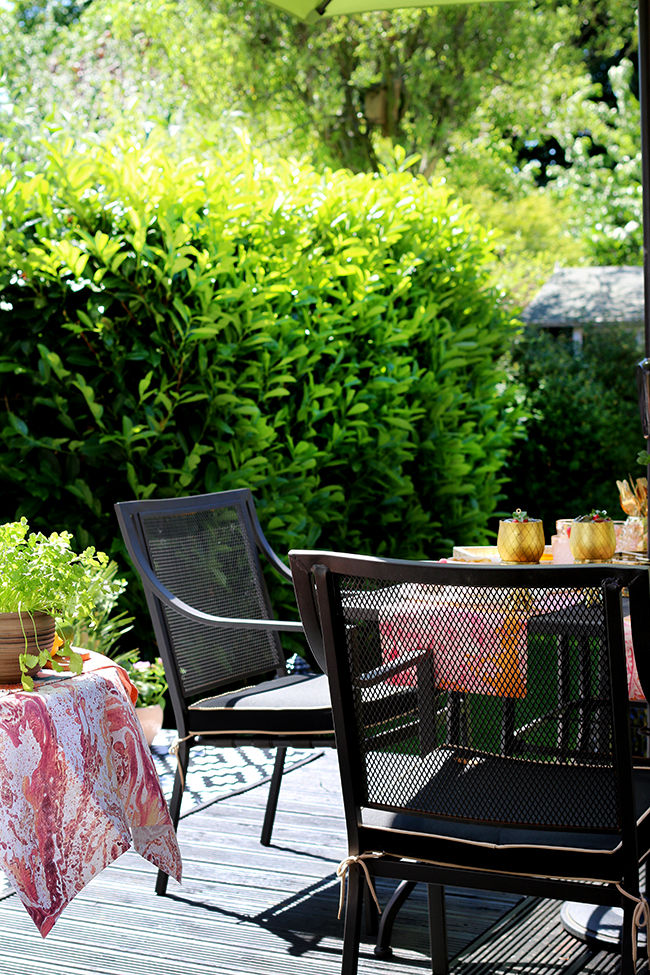 garden patio in black peach and pink with gold accents