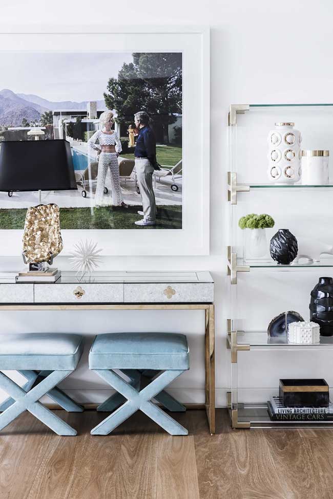 slim aarons print with lucite shelf and x benches