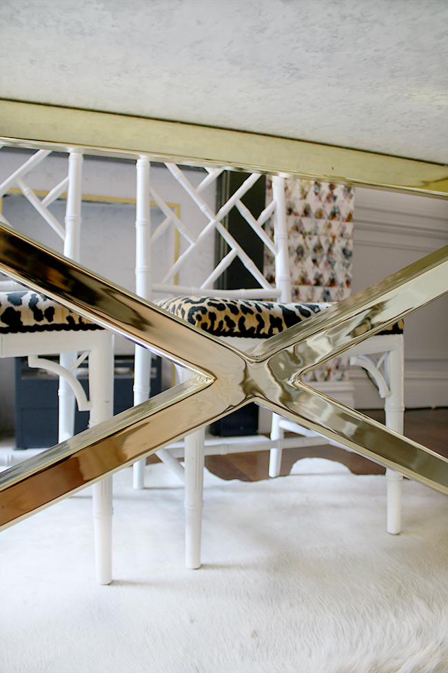 brass table base with marble top