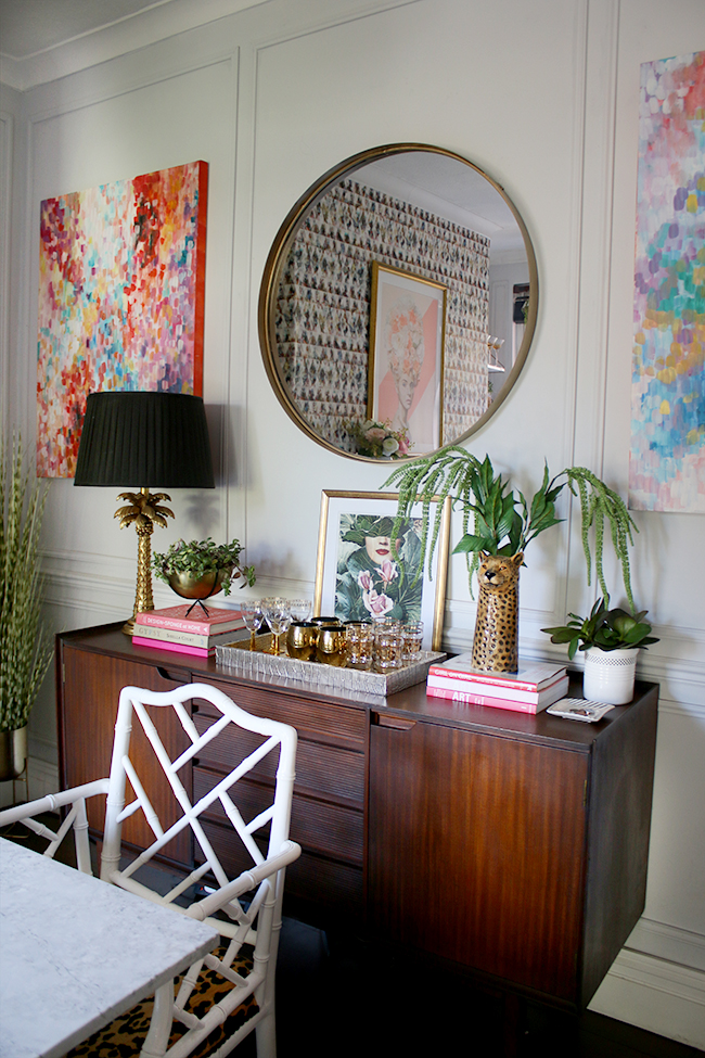 vintage mid century sideboard with large round mirror in gold