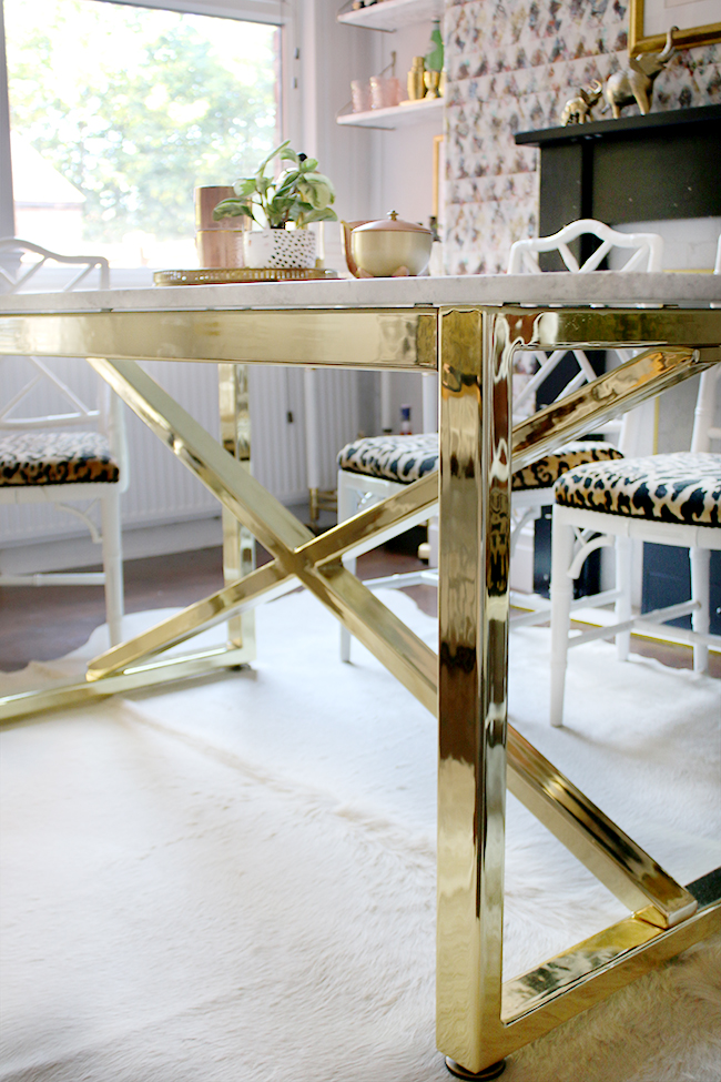 brass table base with marble top