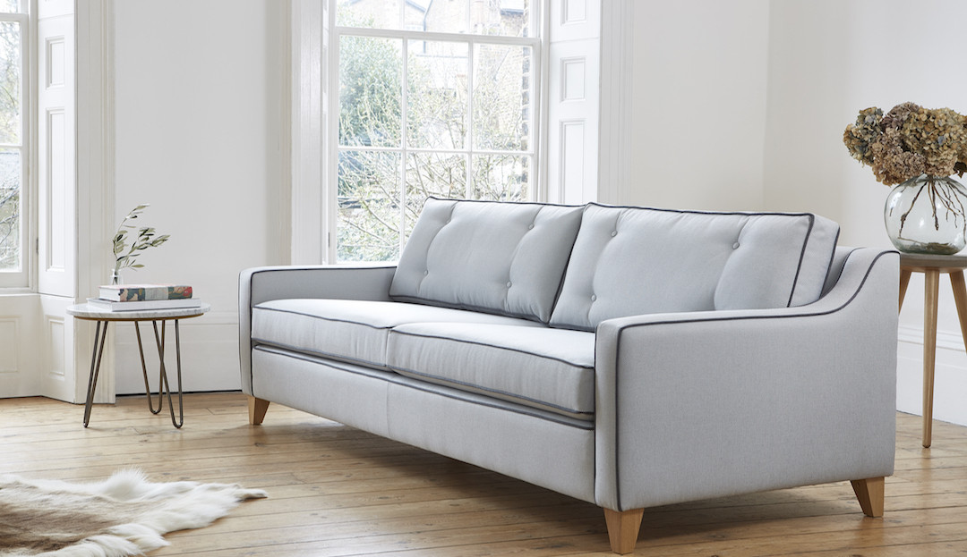 olivia_in_textured_weave_steel_with_midnight_piping_2 sofa by Darlings of Chelsea