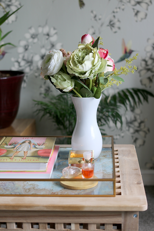 Coffee table details from Majorie's contemporary romantic living room