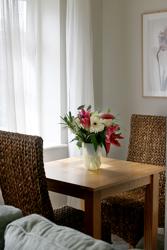 Natural chairs within my Mother in Law's updated contemporary romantic living room