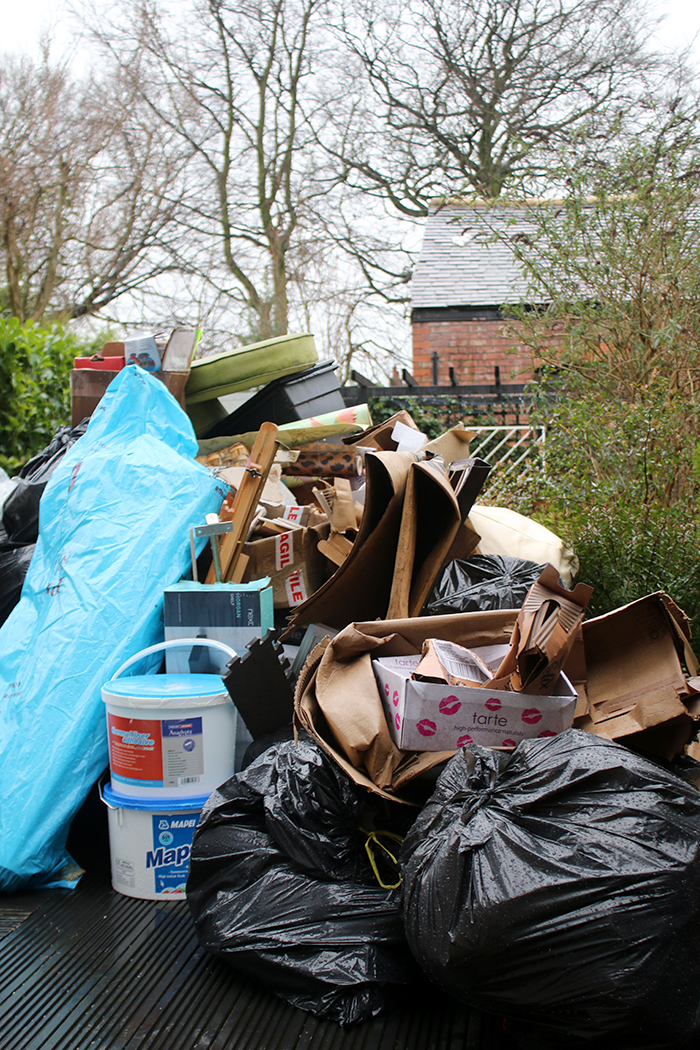 Clearabee Rubbish Removal Services - rubbish pile in back garden to be removed