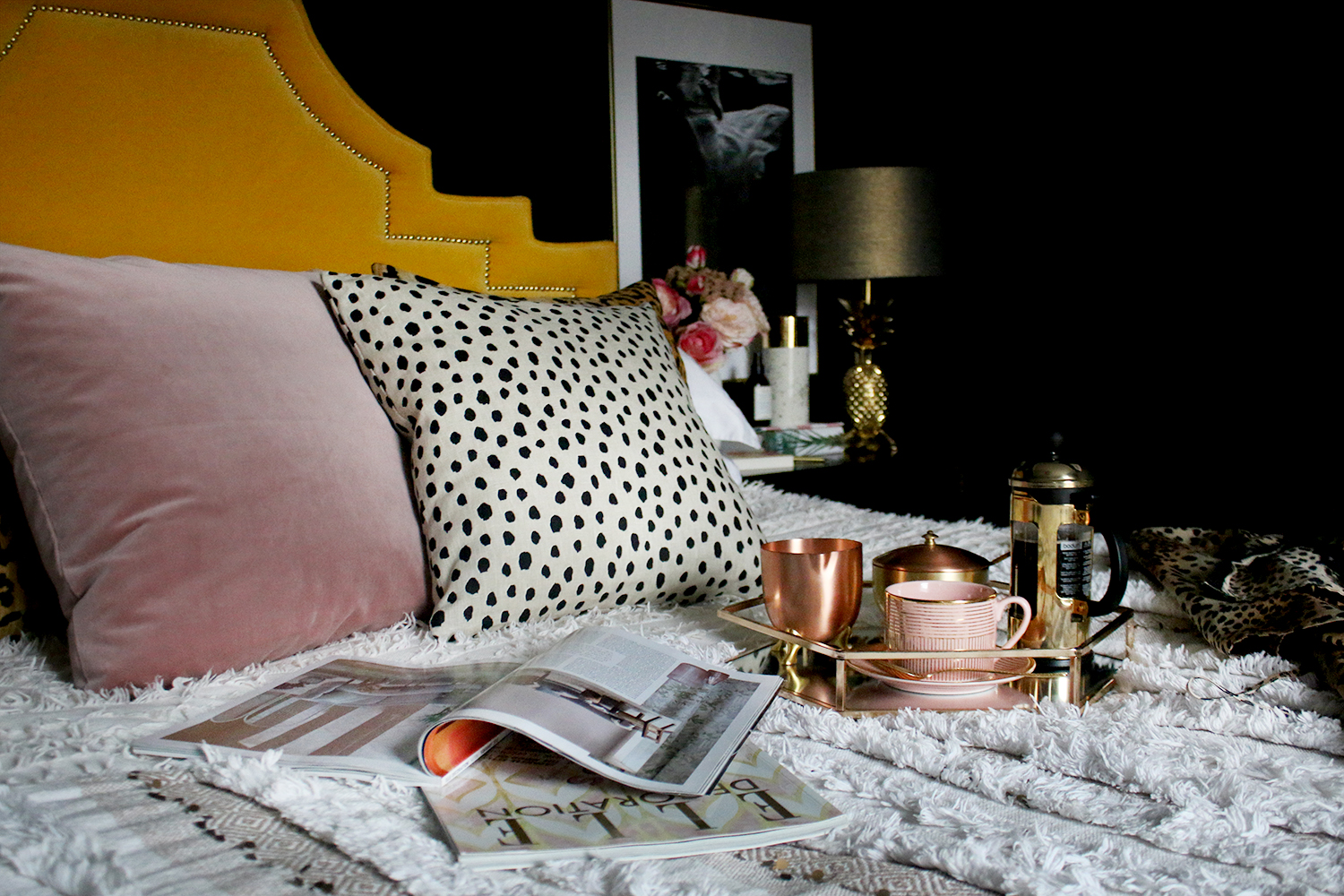 boho glam bedroom in black yellow and blush pink