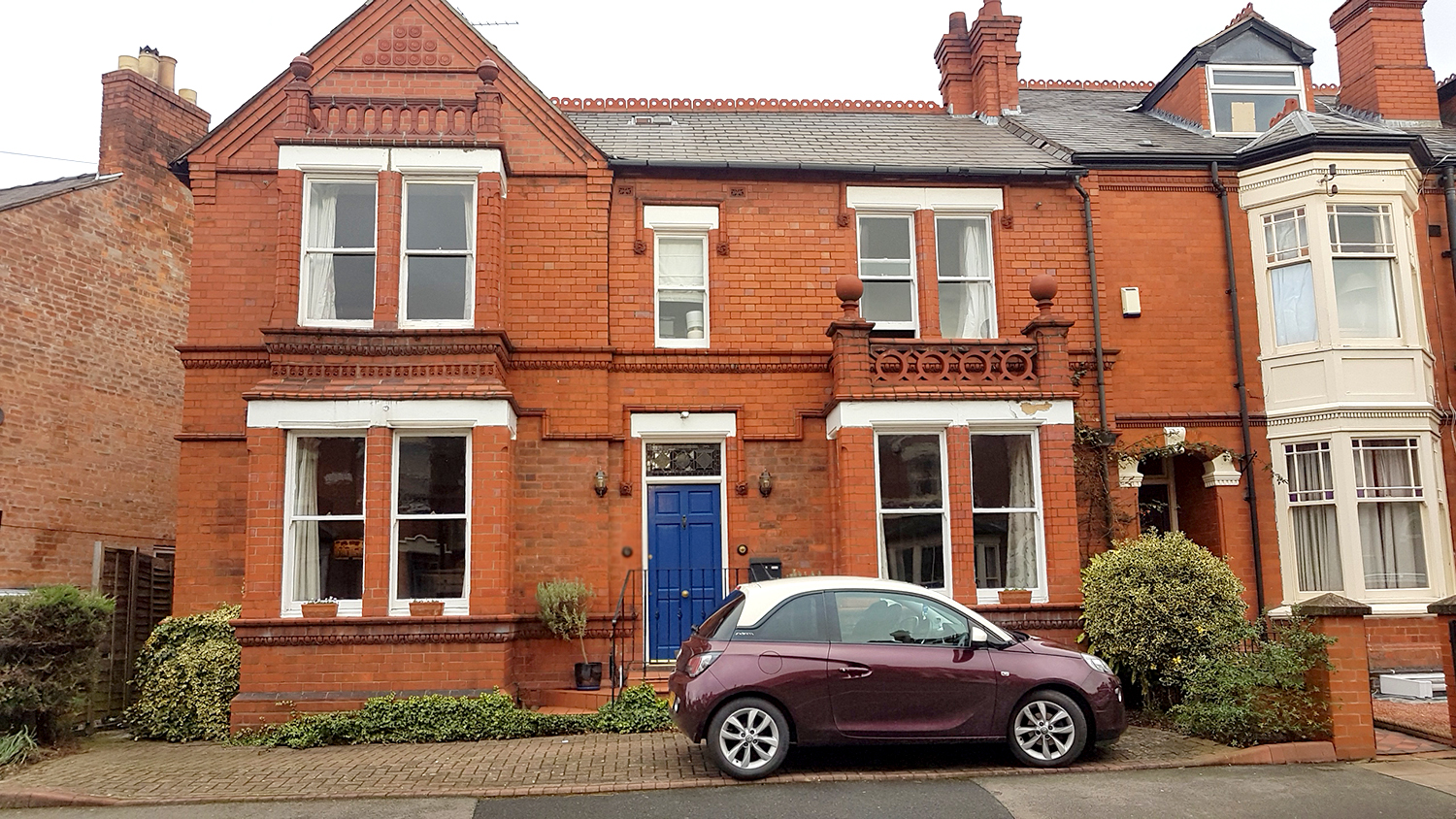 Victorian Double Fronted House in Red Brick with Blue door