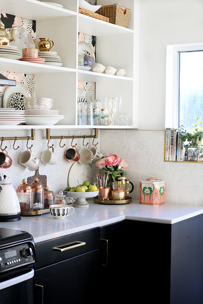 Black and white kitchen with open shelving