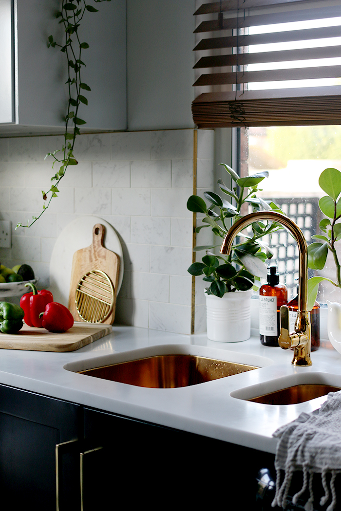 kitchen with gold tap and sink